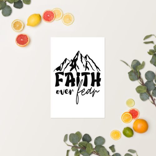 The "Faith Over Fear Poster" features the phrase "Faith over fear" in black, with a mountain graphic above the text, centered on a white background. Surrounded by sliced citrus fruits, whole lemons, and leafy green branches, it's perfect for Christian gifts. christian gifts, religious gifts, gifts of faith, faith based gifts, faith inspired gifts