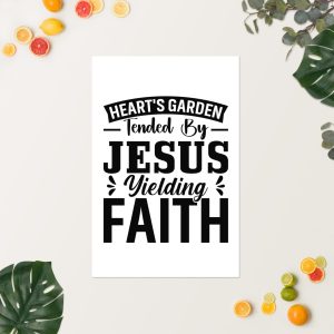 A white piece of paper placed on a light-colored surface is surrounded by greenery and citrus fruits. The paper has a message in bold black text that reads, "Heart's Garden Tended By Jesus Yielding Faith Poster. christian gifts, religious gifts, gifts of faith, faith based gifts, faith inspired gifts