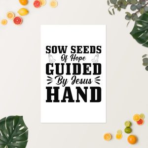 The image features a poster with the text "Sow Seeds of Hope Guided By Jesus' Hand" in bold, black letters surrounded by illustrations of small praying hands. The Sow Seeds Of Hope Guided By Jesus Hand Poster is laid flat on a white surface, bordered by various fresh citrus fruits and green leaves. christian gifts, religious gifts, gifts of faith, faith based gifts, faith inspired gifts