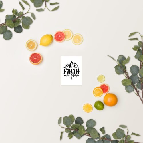 A minimalist arrangement features the "Faith Over Fear" poster surrounded by assorted citrus fruits—lemon, orange, lime, and grapefruit. Eucalyptus branches accent the corners, enhancing a fresh and natural vibe—ideal for those in search of thoughtful Christian gifts. christian gifts, religious gifts, gifts of faith, faith based gifts, faith inspired gifts