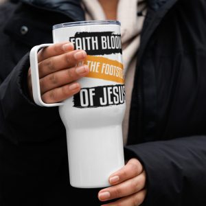 A person wearing a black jacket and light scarf holds a large **Faith Blooms In The Footsteps Of Jesus Travel Mug**. christian gifts, religious gifts, gifts of faith, faith based gifts, faith inspired gifts